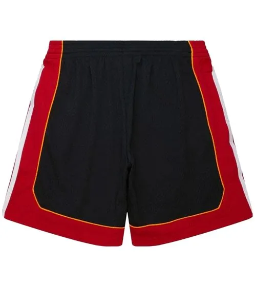 Mitchell and Ness NBA Swingman men's basketball shorts with Miami Heat logo sports pants SMSH6135 black/red